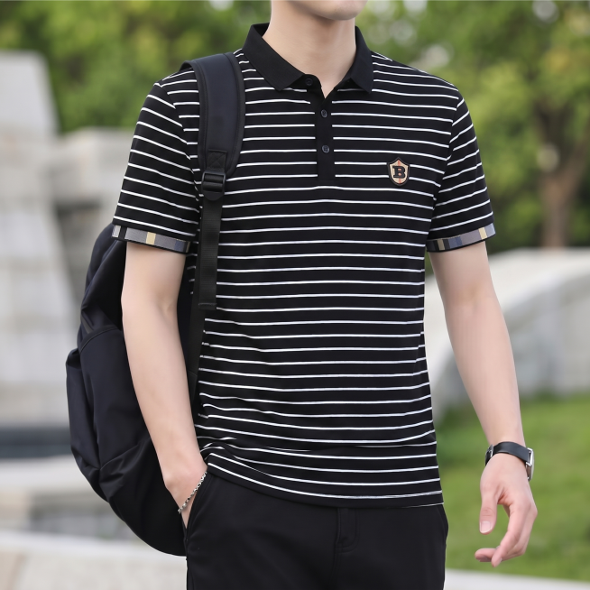 请将参考图 1 的【短袖Polo衫】1:1 还原其款式、颜色、材质、剪裁、图案、版型、五金细节、logo 等所有细节，穿到参考图 2 的模特身上；完全保持参考图 2 模特的身姿、面部、发型、气质、动作预览效果