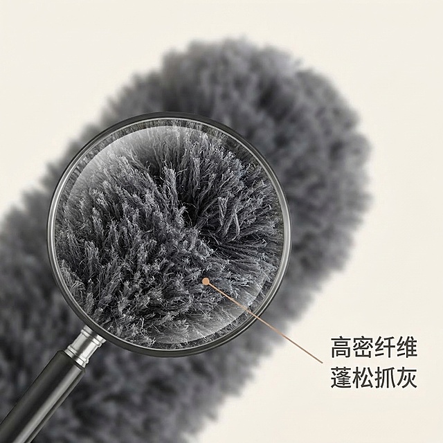 [垫图] https://gdesign-dam-hz.dancf.com/35894461770483757/4f8b5c172843457f900124945ec0fa87.jpg
[主图主题] 除尘掸纤维材质细节展示主图
[氛围/风格] 微距特写质感，干净真实，突出材质优势
[画面元素] 画面主体放大展示除尘掸顶端毛绒纤维部分，圆形放大镜框叠加突出纤维蓬松纹理，框内锐化清晰展示纤维密集结构，框外适度虚化，引线连接标注文字说明，浅暖白色背景，光线柔和均匀突出材质蓬松感，背景铺满全屏
[配色色系] 主色调：浅暖白色背景，深灰色纤维；辅助色：浅棕色引线标注
[视角构图] 微距特写俯视，焦点集中在毛绒纹理上
[文字版式] 引线标注文案 "高密纤维 蓬松抓灰"，字体简洁无衬线，深灰色，放置在放大镜框侧边，不遮挡主体细节，整体干净专业。