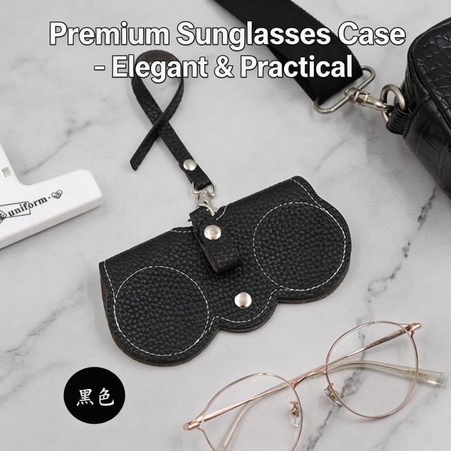 High-quality product photo of a black leather sunglasses case with strap, placed on marble backgroun预览效果