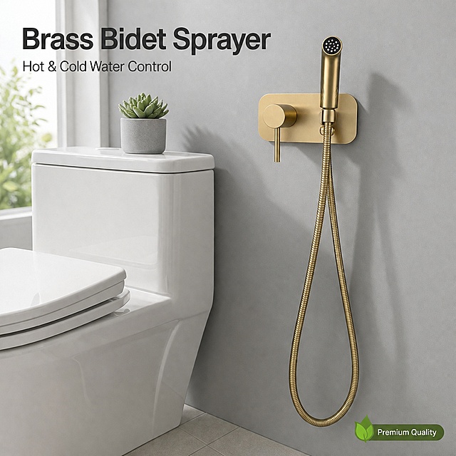 Amazon main image 2, lifestyle scene of brushed gold wall-mounted bidet sprayer installed in a modern minimalist bathroom. The sprayer set is mounted on a matte light gray wall next to a white ceramic toilet with closed lid. Small potted succulent on toilet tank as decoration. Soft natural daylight from side window, gentle shadows on the wall. Realistic bathroom environment with clean tiled floor implied. Product occupies about 65% of frame, clearly visible and sharp. Top left area has clean negative space with bold English headline text "Brass Bidet Sprayer" in dark sans-serif font, smaller subtitle "Hot & Cold Water Control" underneath. Bottom right corner has small green leaf icon tag with "Premium Quality". Keep product appearance, structure, brushed gold finish and proportions exactly identical to reference product images. 1:1 square, bright and airy commercial lifestyle photography, high resolution, no watermarks, no platform logos.