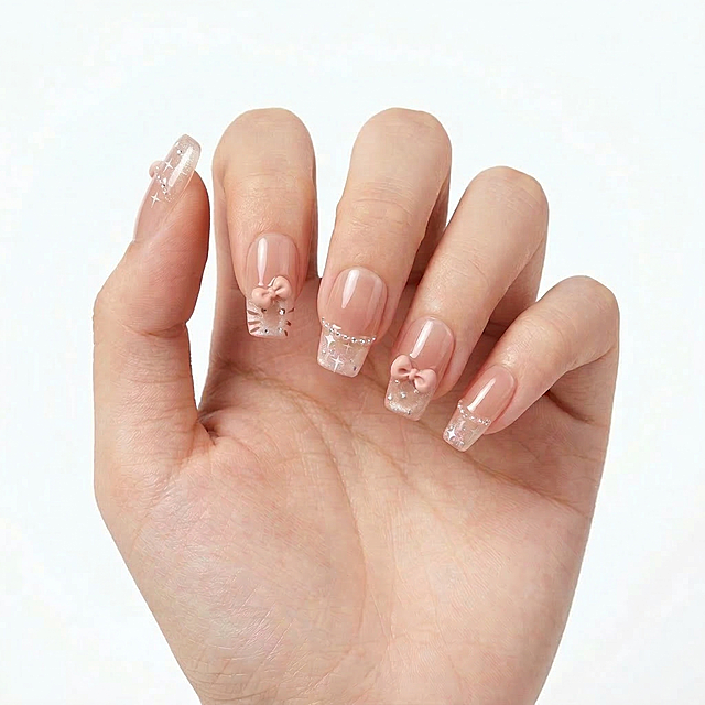 [垫图] https://gd-visitor.dancf.com/tmp02/e7e3e6fc3eb67ef2402ccf58479a28d8/03dc91dffae1440caa716edcdac9b512.jpg
[主图主题] Press On Nails product main image
[氛围/风格] Low saturation high-end minimalist style, soft natural lighting, clean texture
[画面元素] A Caucasian model's single hand wearing this nude bow press on nails, hand naturally stretched out in the center of the frame, the nail surface is completely clear and visible, pure white #FFFFFF background, product accounts for more than 85% of the frame, background fills the full screen without border
[配色色系] Main tone: pure white, nude pink, beige. Low saturation color matching, no messy elements
[视角构图] Front eye level shooting, centered composition, clear focus
[文字版式] No additional text, only product display, keep the main picture pure and in line with cross-border platform requirements