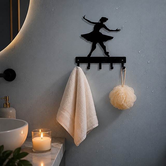 [Main Image 2] Bathroom scene display image for Ballet dancer silhouette wall hook. Keep the original product's black iron material, ballet dancer silhouette shape and 5 hook structure completely consistent. Product installed on light blue bathroom wall with water droplets, hanging a beige towel and a loofah sponge as shown in the reference image, show the actual use effect. The background is a clean modern bathroom space, with a lit candle on the countertop to create a warm atmosphere. Soft side lighting, clear layering, commercial home photography texture. 1:1 square, all text in English. No marketing information, product is the core focus. Negative prompt: deformation, text clutter, blurred product, messy background, watermark, logo